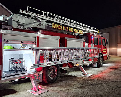 fire truck with ladder on its side